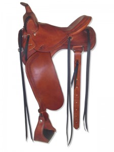 Chestnut Western Trail Saddle with butterfly skirts skirts Western rigging and a flank cinch, Frank Bell pommel with a horn, slick seat with a Cheyenne roll, wide fenders and border tooling.