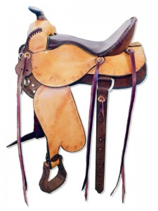 Brown Russet Western Trail Saddle with butterfly skirts with Western rigging and a flank cinch, Frank Bell pommel with a horn, extra padded seat with Mexican braided cantle, wide fenders and border tooling.