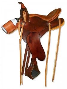 Brown Lightweight Trail Saddle with cutback skirts and bulkless English rigging, wide pommel, extra padded tan seat with cantle binding, streamlined fenders and water bottle holders.